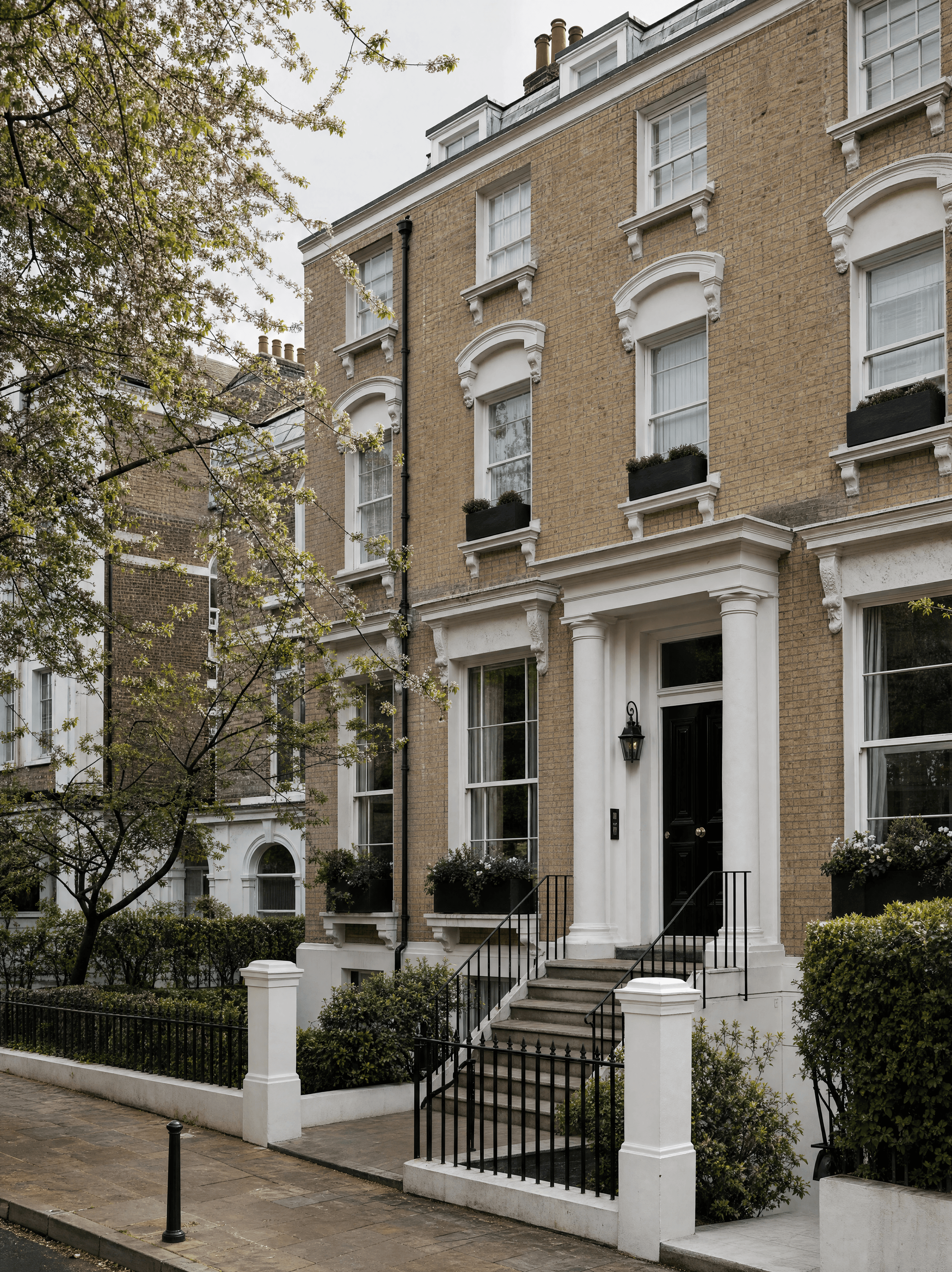Well-presented Victorian terraced house exterior in a London street